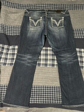 Vigoss faded blue jeans with white contrast stitching